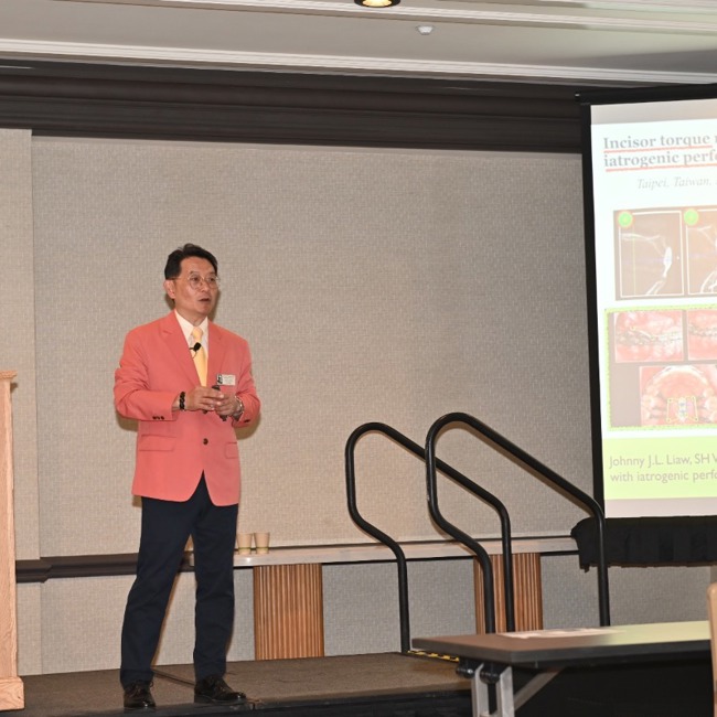 dr johnny liaw given a lecture on vertical control