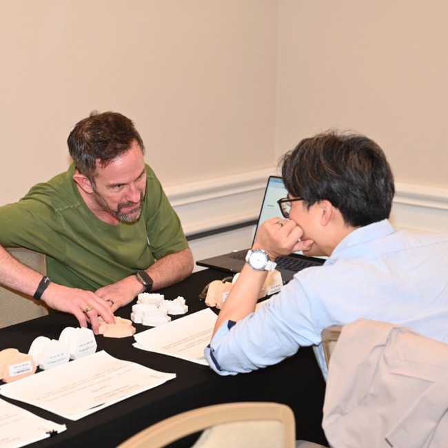 dr safirstein and dr lee discussing some cases